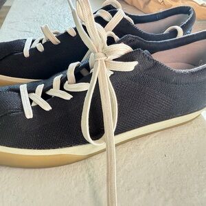 Rothy's Black and Cream Lace-Up Sneakers